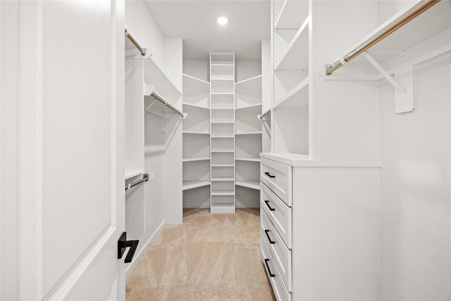 Custom closet in Primary Bedroom