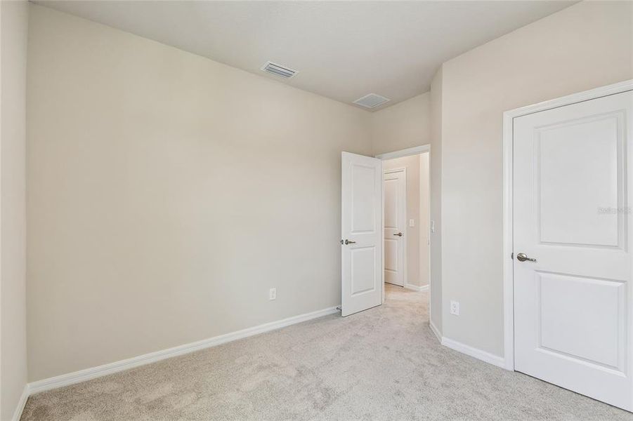 Spacious, unfurnished interior of a new home in Oakfield at Mount Dora Cottage Series, Mount Dora (Image 35).