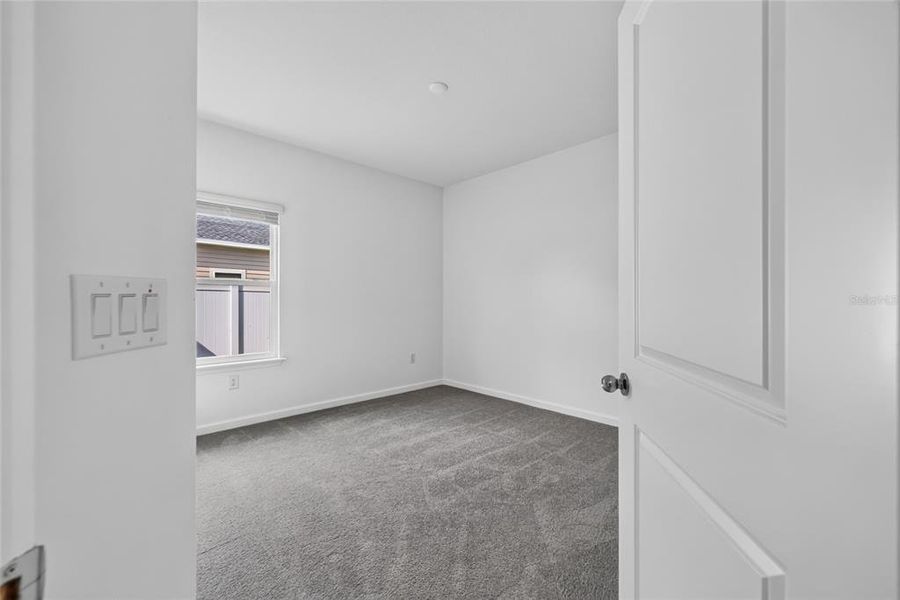 Spacious, unfurnished interior of a new home in Heath Preserve, Ocala (Image 18).