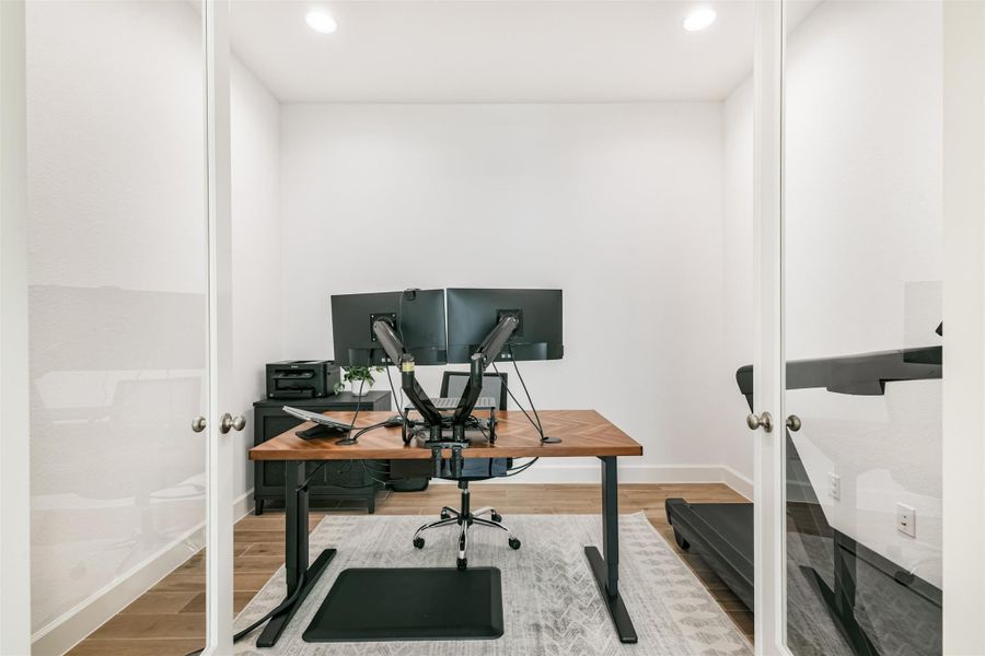 Office also opens off of the entry hall with French doors and wood look tile floors. Office also opens off of the entry hall with French doors and wood look tile floors.