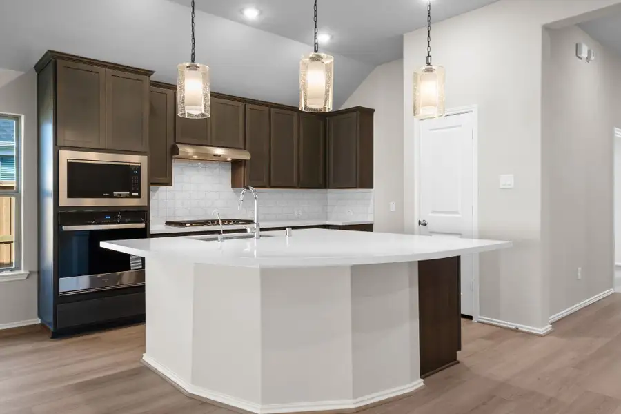 Furnished interior view inside a new home in Dunham Pointe 50', Cypress (Image 7).