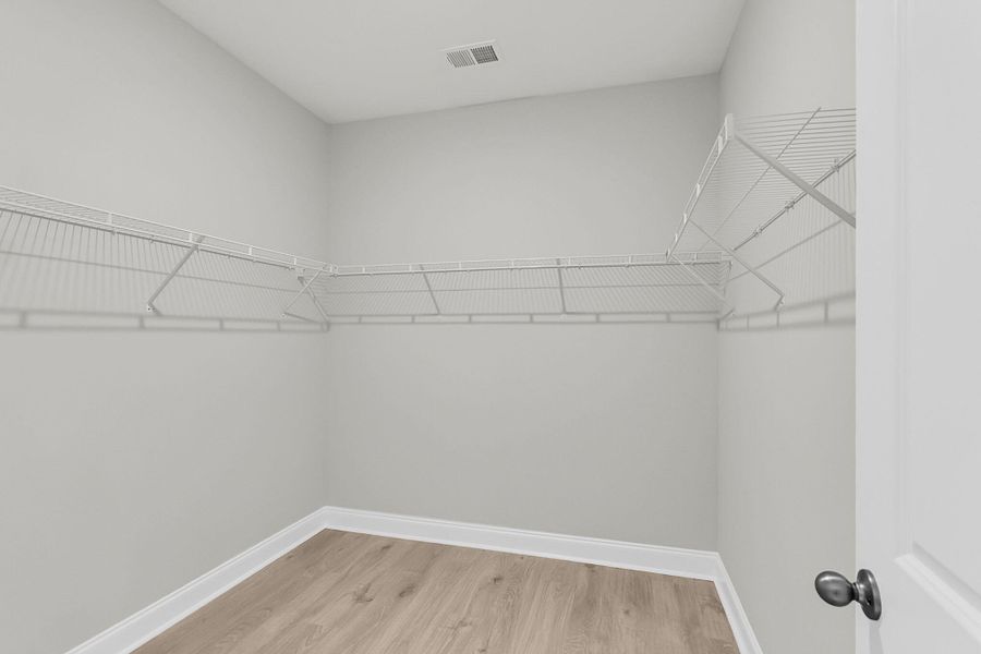 Spacious, unfurnished interior of a new home in Tidewater at Lakes of Cane Bay, Summerville (Image 24). Spacious, unfurnished interior of a new home in Tidewater at Lakes of Cane Bay, Summerville (Image 24).