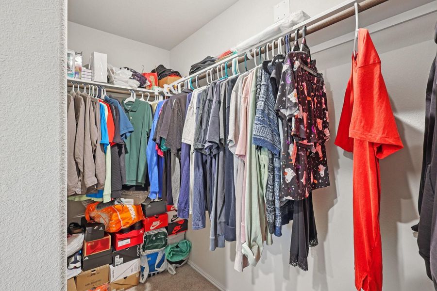 Large walk-in closet Large walk-in closet
