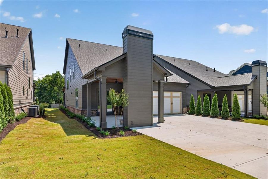 Front exterior of a new home in , Flowery Branch, GA, highlighting curb appeal (Image 33). Front exterior of a new home in , Flowery Branch, GA, highlighting curb appeal (Image 33).