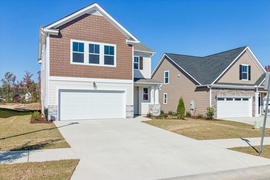 Front exterior of a new home in Tillery Park, Grovetown, GA, highlighting curb appeal (Image 21). Front exterior of a new home in Tillery Park, Grovetown, GA, highlighting curb appeal (Image 21).