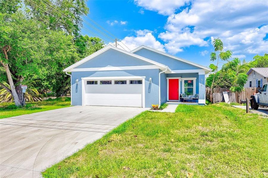 Front exterior of a new home in , St. Petersburg, FL, highlighting curb appeal (Image 24).