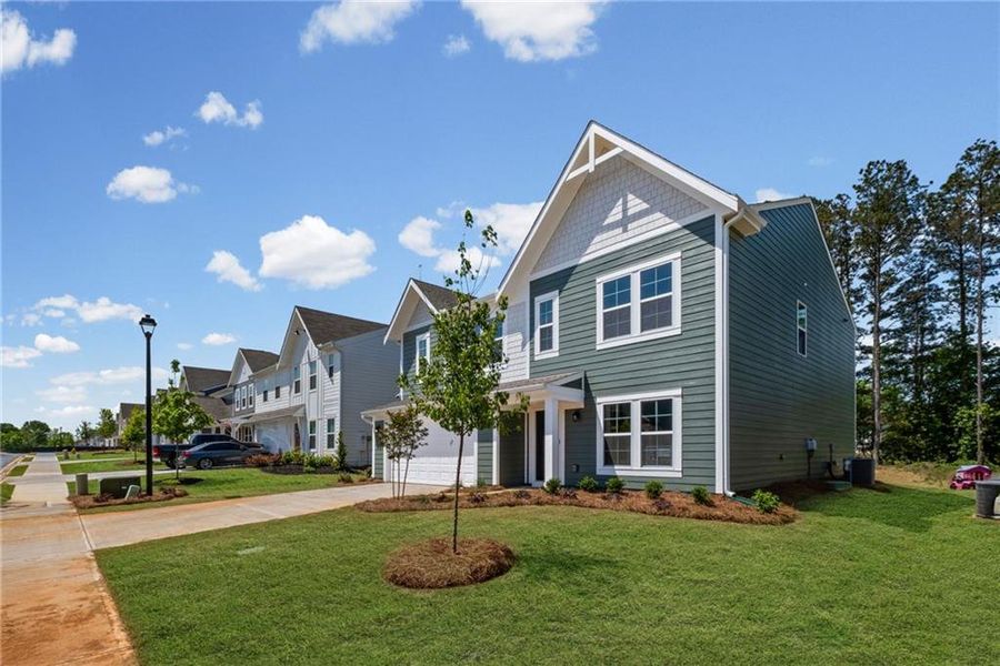Front exterior of a new home in Cherry Glen, Euharlee, GA, highlighting curb appeal (Image 16).