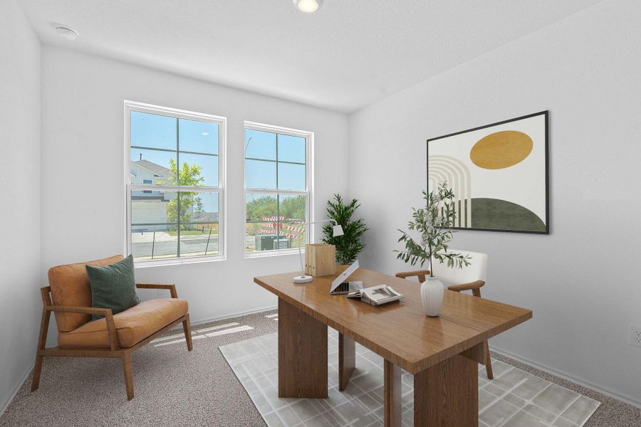 Home office with light colored carpet and baseboards Home office with light colored carpet and baseboards