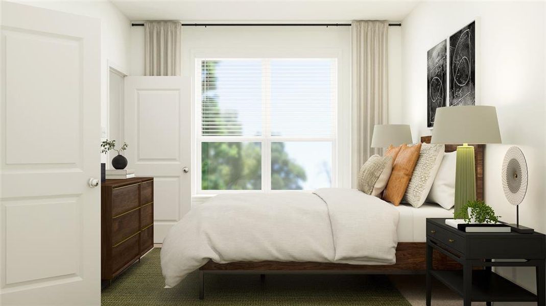 Bedroom featuring carpet floors