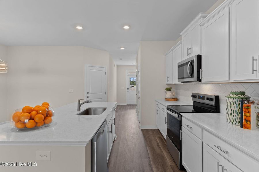Furnished interior view inside a new home in Coastal Haven Townes, Leland (Image 4).