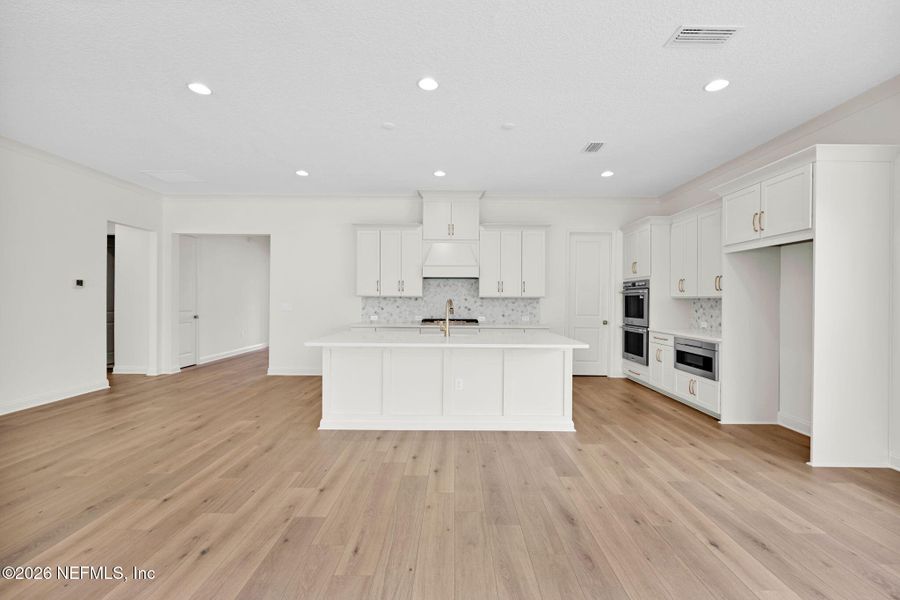 Furnished interior view inside a new home in Amelia National Country Club, Fernandina Beach (Image 6).