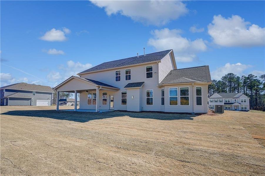 Exterior details and patio area of a home in Riverbend Overlook, Fayetteville (Image 4).