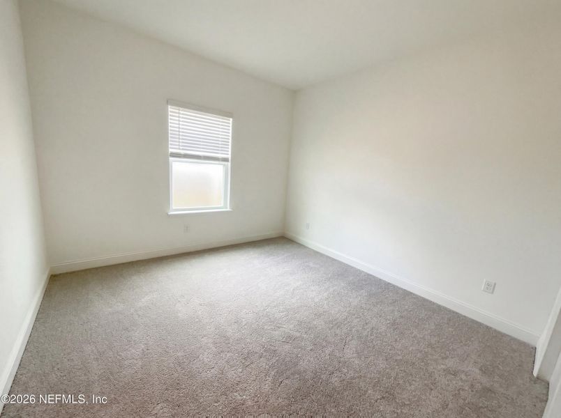 Spacious, unfurnished interior of a new home in Tributary, Yulee (Image 18).