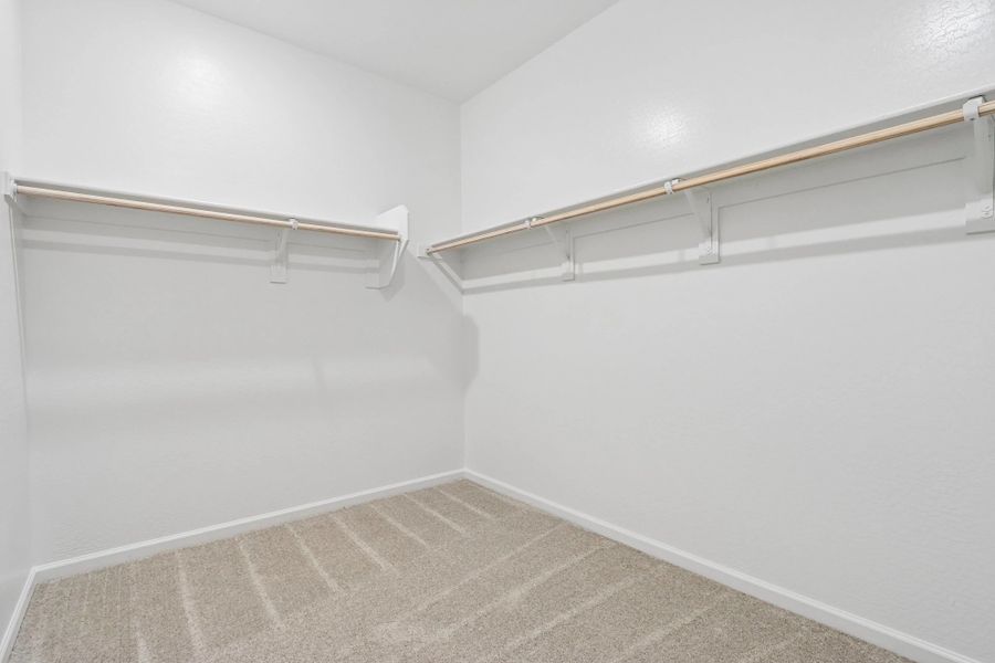 Primary walk in closet Primary walk in closet