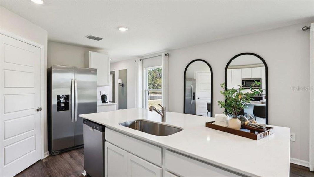 Furnished interior view inside a new home in Lake Deer Estates, Poinciana (Image 14).
