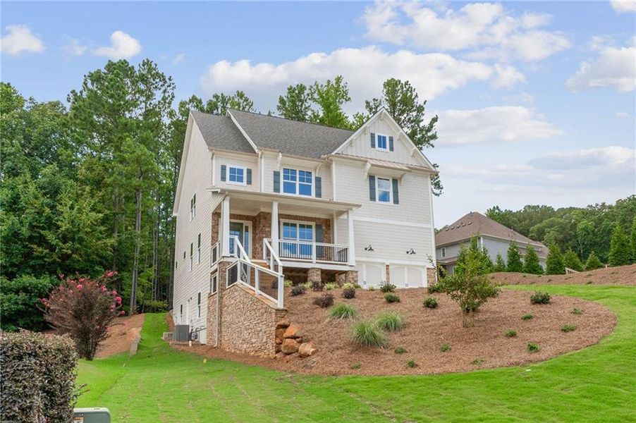 Front exterior of a new home in , Dallas, GA, highlighting curb appeal (Image 17).