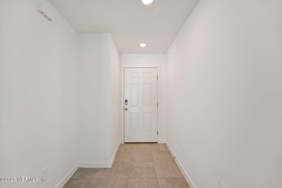 Spacious, unfurnished interior of a new home in Flagler Village - Classic Series, Palm Coast (Image 23). Spacious, unfurnished interior of a new home in Flagler Village - Classic Series, Palm Coast (Image 23).