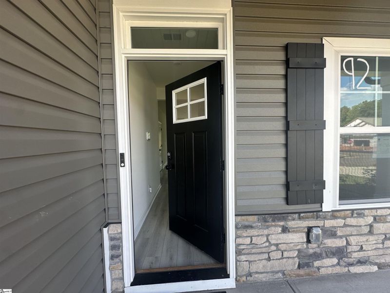 Front exterior of a new home in Shiloh Trail, Wellford, SC, highlighting curb appeal (Image 24). Front exterior of a new home in Shiloh Trail, Wellford, SC, highlighting curb appeal (Image 24).