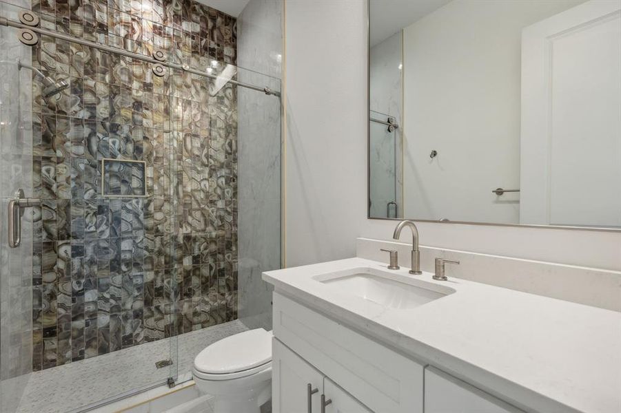 Bathroom attached to Secondary bedroom on main floor