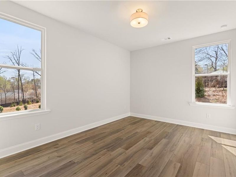 Spacious, unfurnished interior of a new home in Melody Lakeside Estates, Buford (Image 22).