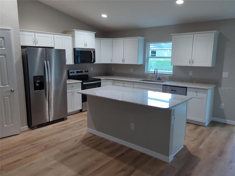 Furnished interior view inside a new home in , Dunnellon (Image 7).