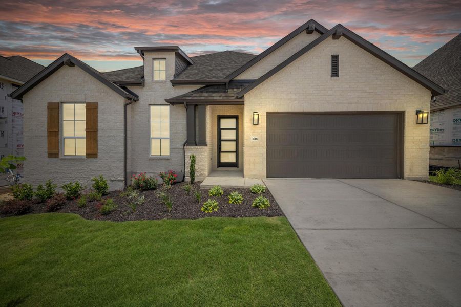 Front exterior of a new home in Palmera Ridge: 60ft. lots, Leander, TX, highlighting curb appeal (Image 2). Front exterior of a new home in Palmera Ridge: 60ft. lots, Leander, TX, highlighting curb appeal (Image 2).