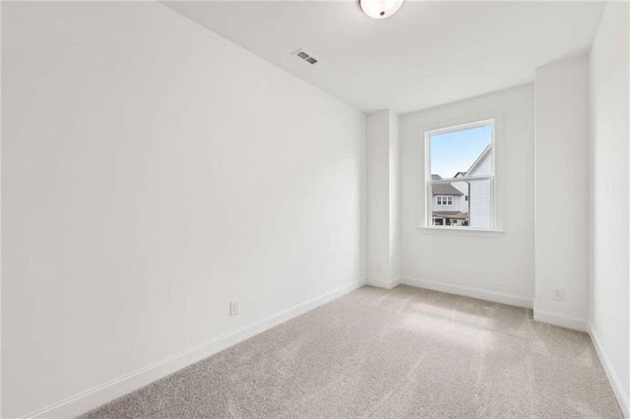 Spacious, unfurnished interior of a new home in East Harbor II at Chestatee, Dawsonville (Image 32).