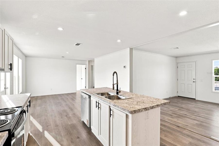 Furnished interior view inside a new home in , Okeechobee (Image 6).