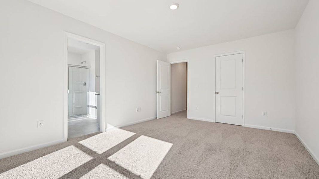 Spacious, unfurnished interior of a new home in Chapel Townes, Raleigh (Image 20).