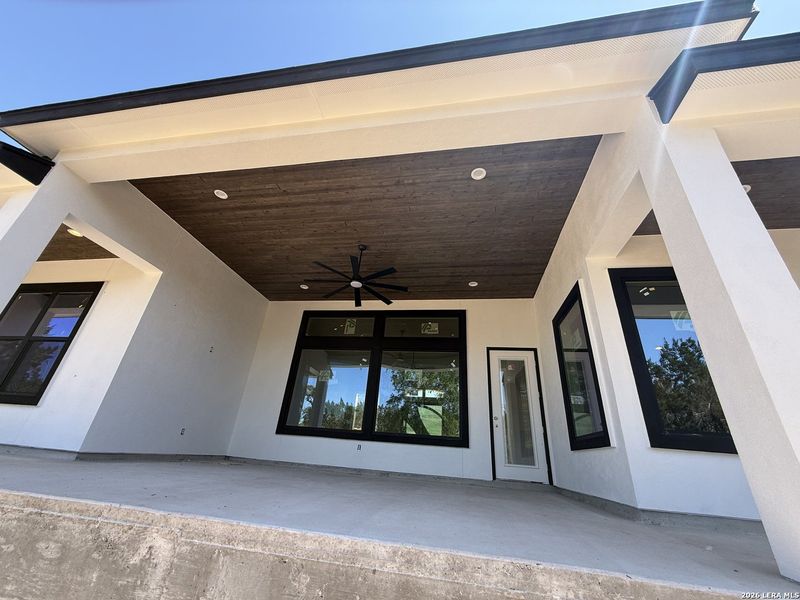 Exterior details and patio area of a home in , Spring Branch (Image 11).