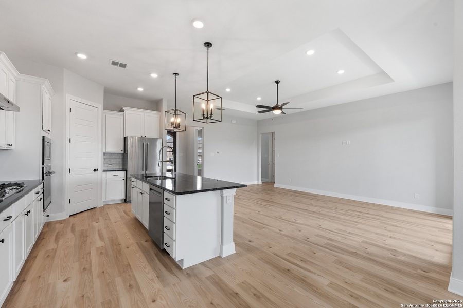 Furnished interior view inside a new home in Potranco West, Castroville (Image 6).