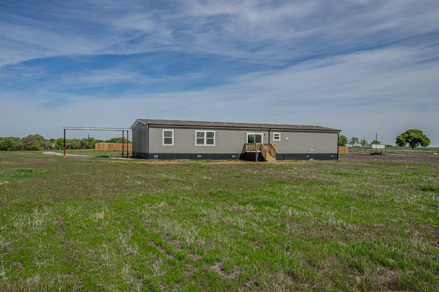 Exterior details and patio area of a home in , Sunset (Image 28).