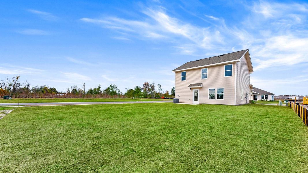 Exterior details and patio area of a home in Hodges Bayou Plantation, Panama City (Image 19).