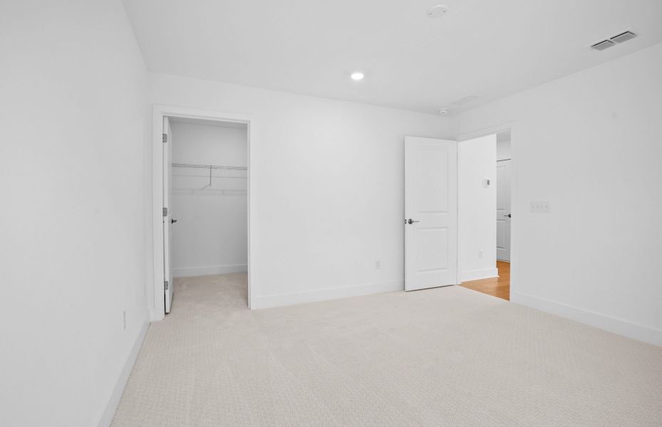 Representative unfurnished interior of a home built from the Mystique by Pulte Homes in Forest Creek, Waxhaw (Image 29).