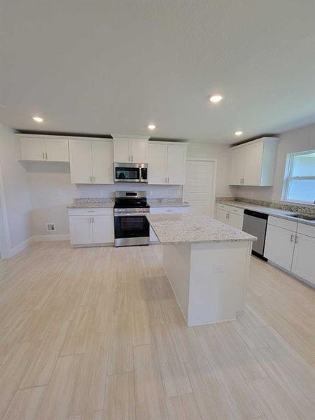 Furnished interior view inside a new home in , Ocala (Image 11).
