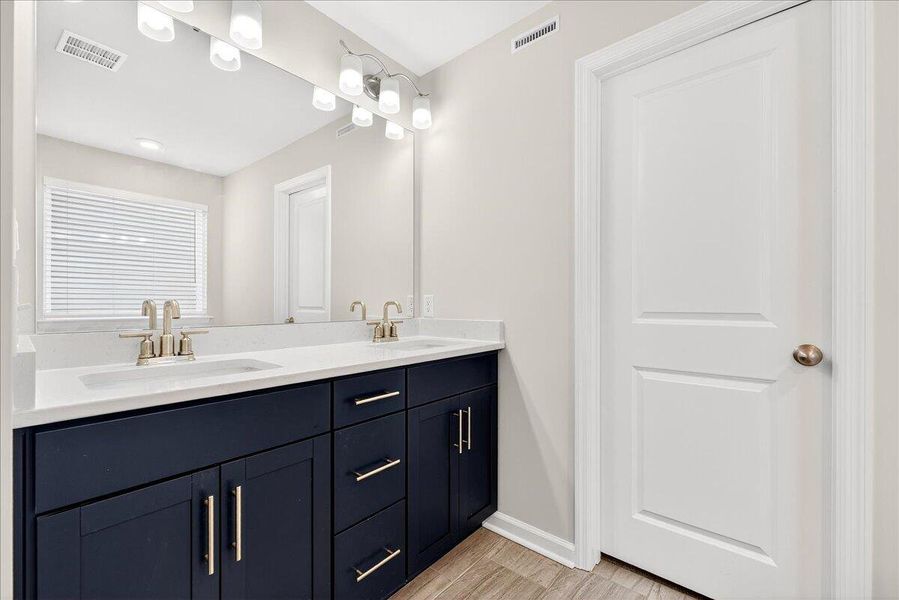 Furnished interior view inside a new home in Jasmine Point at Lakes of Cane Bay, Summerville (Image 5).