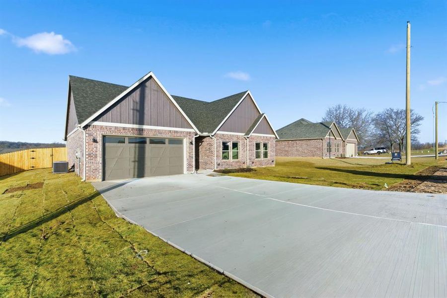 Front exterior of a new home in , Bridgeport, TX, highlighting curb appeal (Image 24).