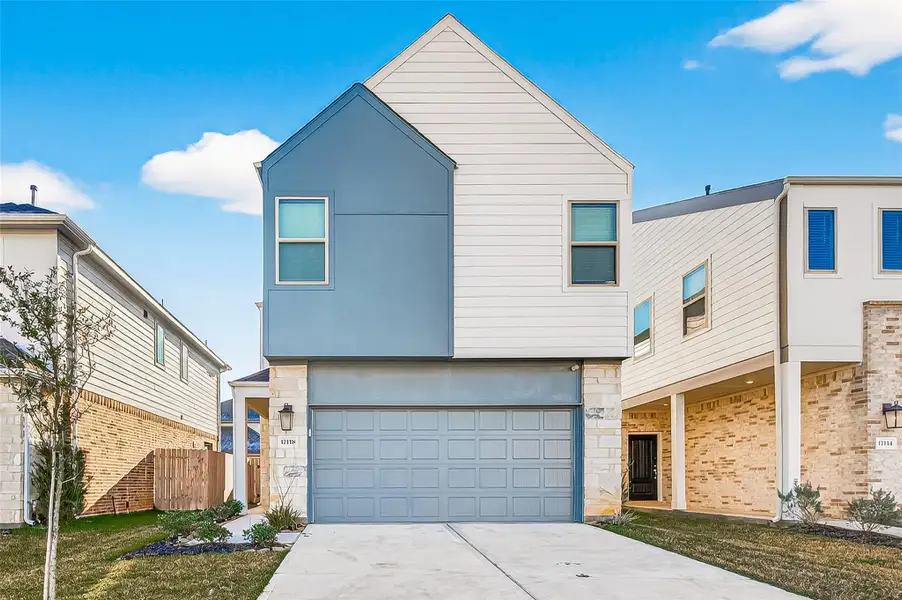Front exterior of a new home in , Hockley, TX, highlighting curb appeal (Image 1). Front exterior of a new home in , Hockley, TX, highlighting curb appeal (Image 1).