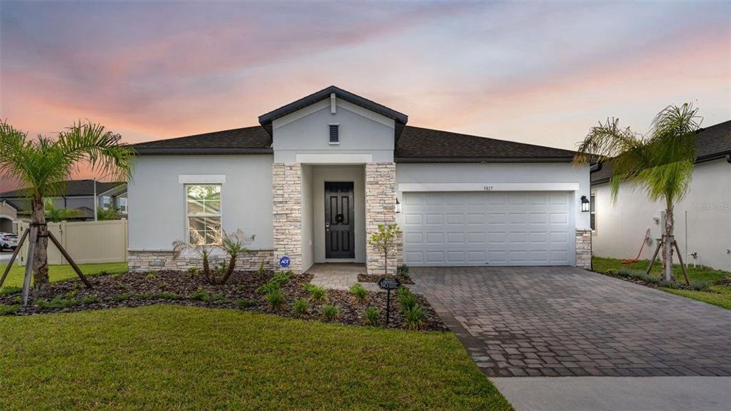 Front exterior of a new home in , Lakeland, FL, highlighting curb appeal (Image 27).
