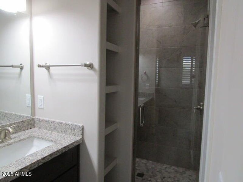 Linen Storage and Walkin Shower