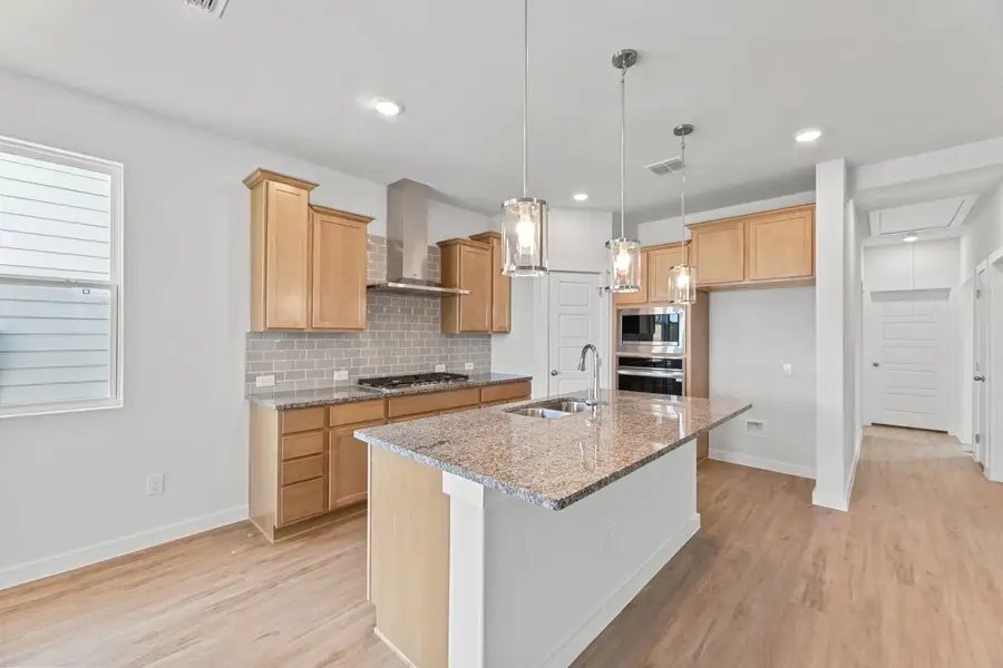 Representative furnished interior of a home built from the Sabrine by Hakes Brothers in Highland Ridge, New Braunfels (Image 8).