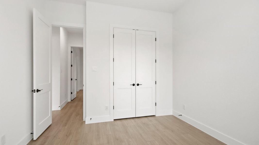 Representative unfurnished interior of a home built from the Amalfi by D.R. Horton in Butlers Bend Estates, Pinehurst (Image 31).