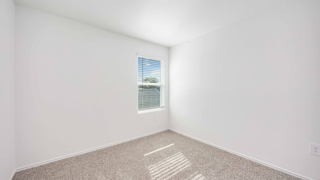 Representative unfurnished interior of a home built from the Franklin by D.R. Horton in Legacy Village, Houston (Image 13).