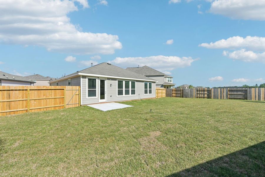 Come and see this spacious backyard with the extended covered rear patio! There is plenty of room for the kids to play and adults to relax! Perfect for your outdoor living space, patio furniture, bbq pit, and so much more. The possibilities are endless!