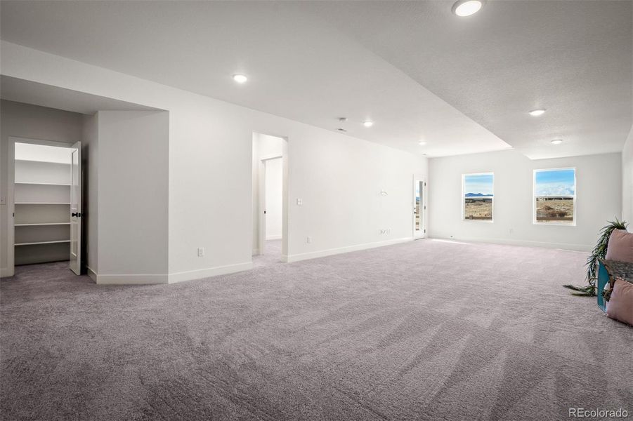 Spacious, unfurnished interior of a new home in Revel Crossing at Wolf Ranch - The Panorama Collection, Colorado Springs (Image 32).