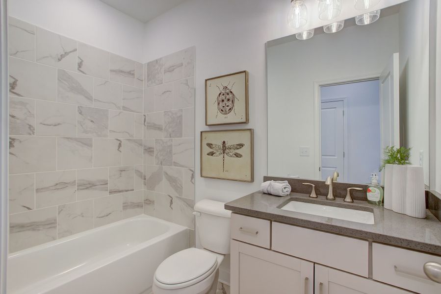 Bathroom with a stand up tub