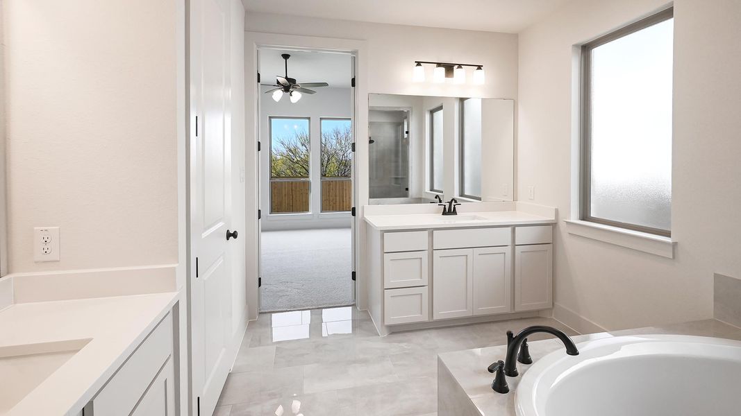 Furnished interior view inside a new home in Crosswinds 50', Kyle (Image 12).