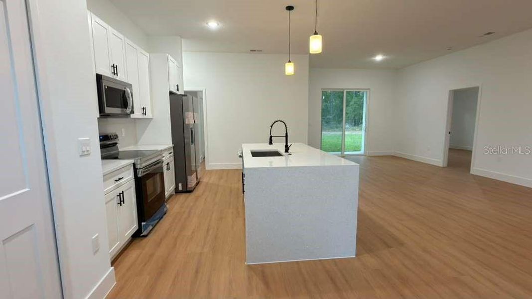 Furnished interior view inside a new home in , Citrus Springs (Image 14).