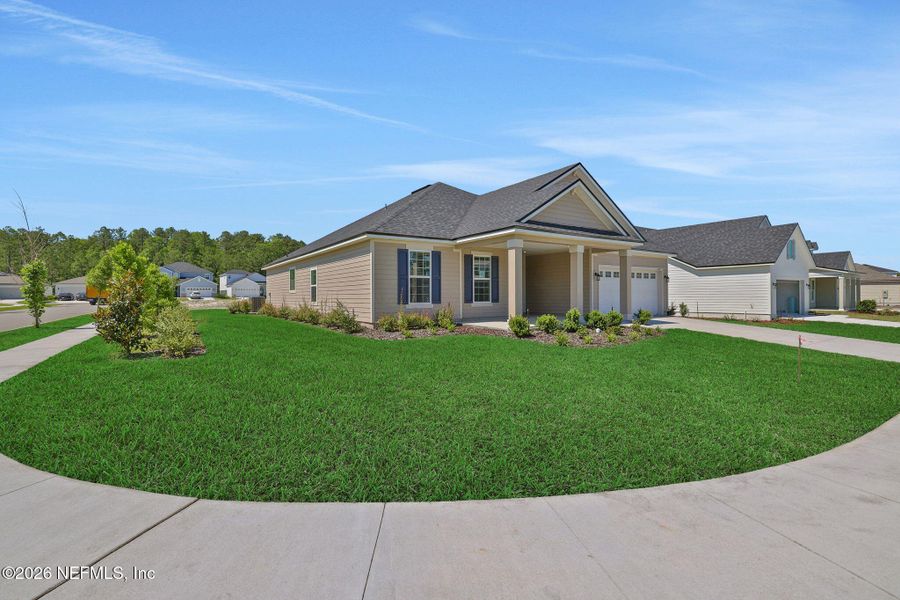 Front exterior of a new home in Hyland Trail, Green Cove Springs, FL, highlighting curb appeal (Image 25). Front exterior of a new home in Hyland Trail, Green Cove Springs, FL, highlighting curb appeal (Image 25).