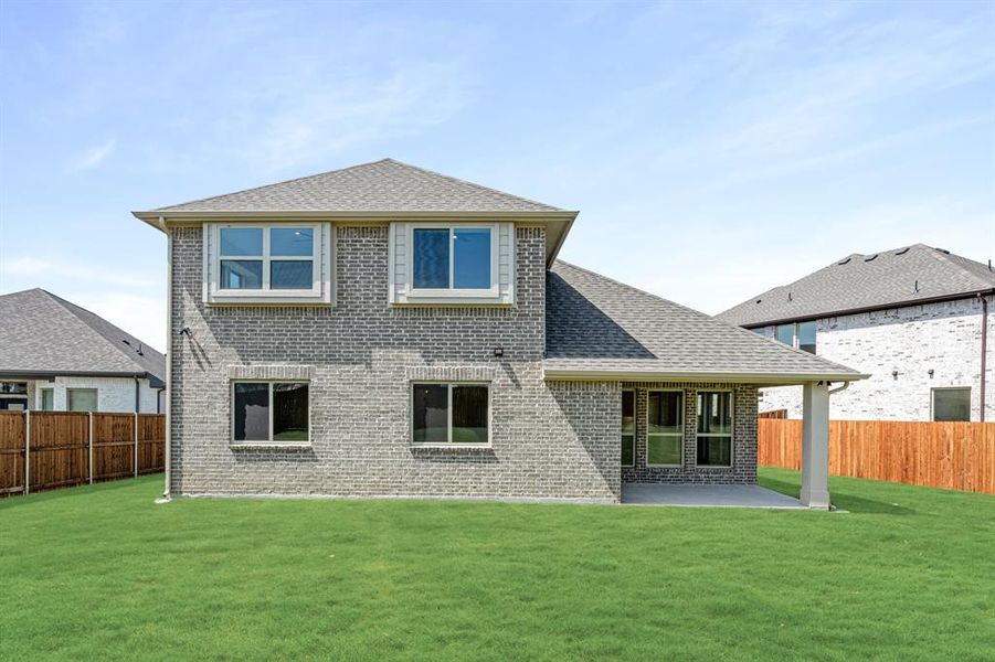 Front exterior of a new home in Willow Wood Classic 50, McKinney, TX, highlighting curb appeal (Image 2). Front exterior of a new home in Willow Wood Classic 50, McKinney, TX, highlighting curb appeal (Image 2).